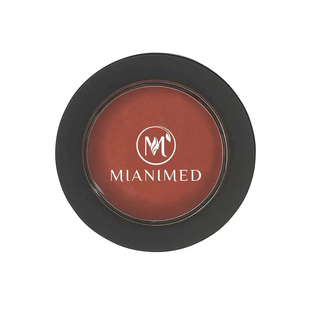 MIANIMED premium skincare product in round black container with logo visible.