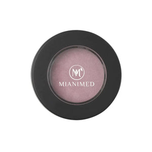 MIANIMED premium skincare product in black circular container with logo.
